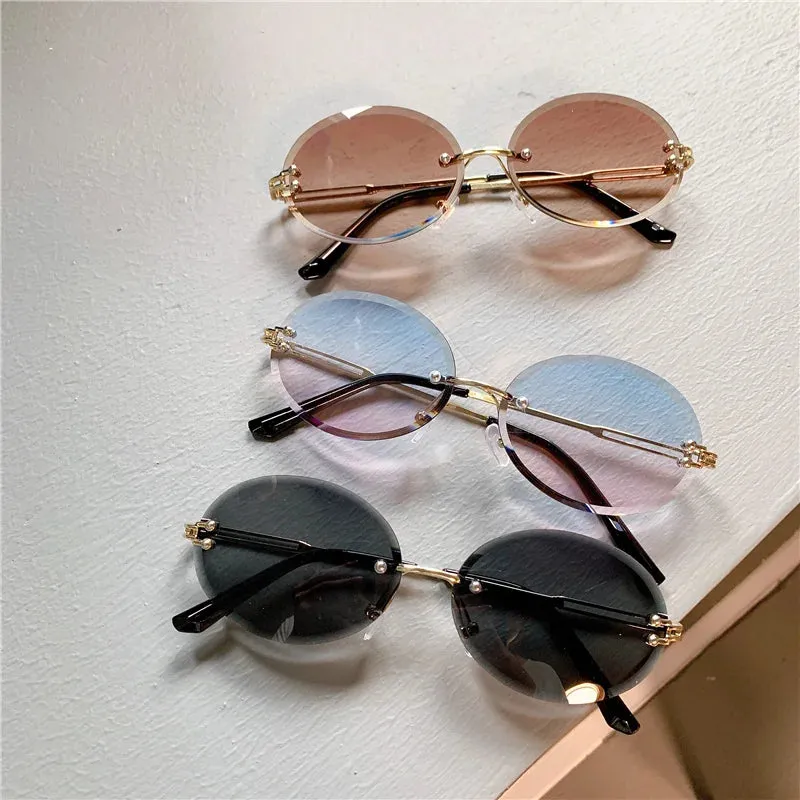 VAIGE Stylish Rimless Oval Sunglasses in Sleek Black - UV400 Protection