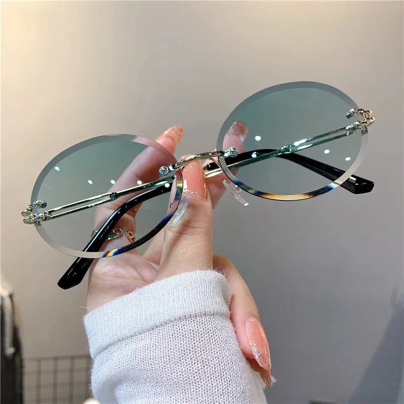VAIGE Stylish Rimless Oval Sunglasses in Sleek Black - UV400 Protection