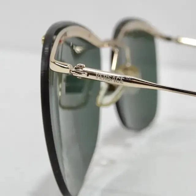 Versace 1990s Black/Gold Sunglasses
