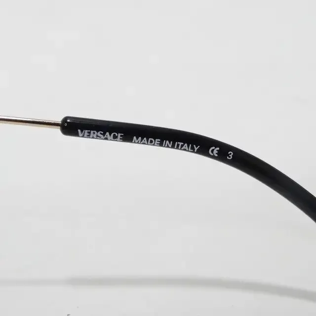 Versace 1990s Black/Gold Sunglasses