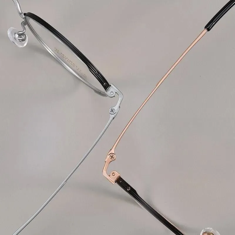 Yimaruili Unisex Full Rim Small Round Titanium Eyeglasses 95955bt